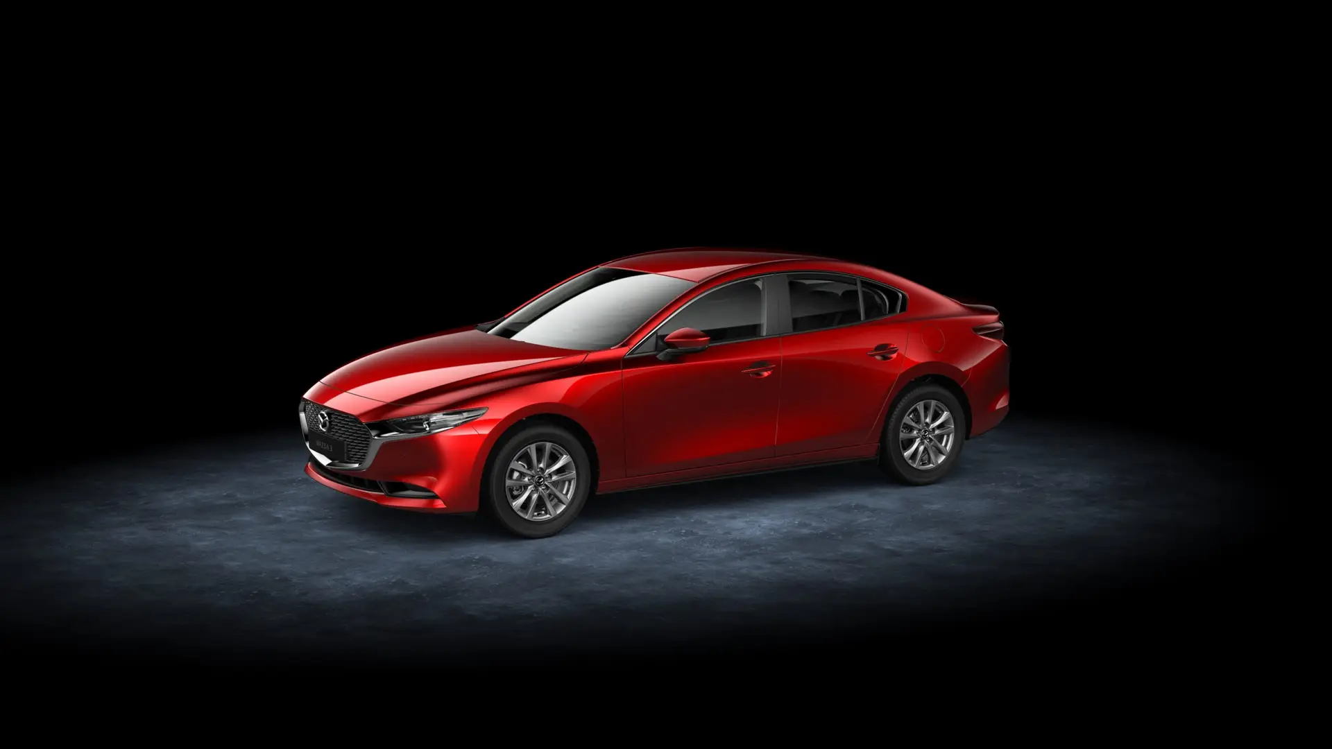 Mazda 3 vista lateral en parque